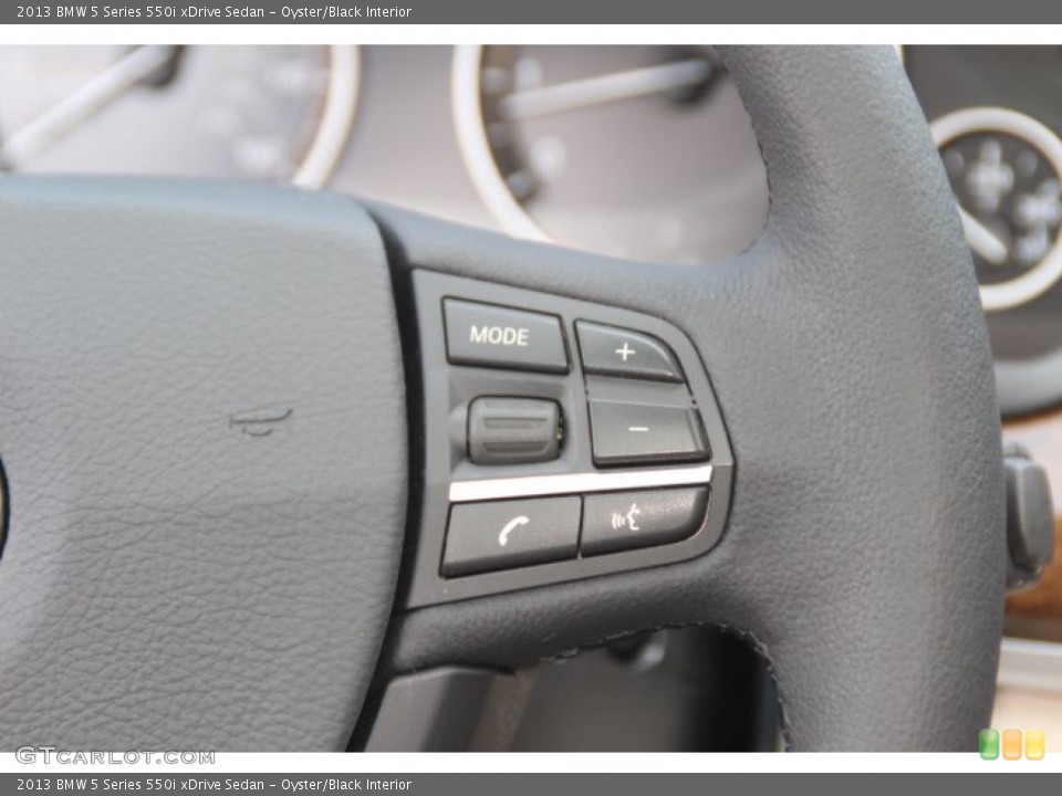 Oyster/Black Interior Controls for the 2013 BMW 5 Series 550i xDrive Sedan #84850387