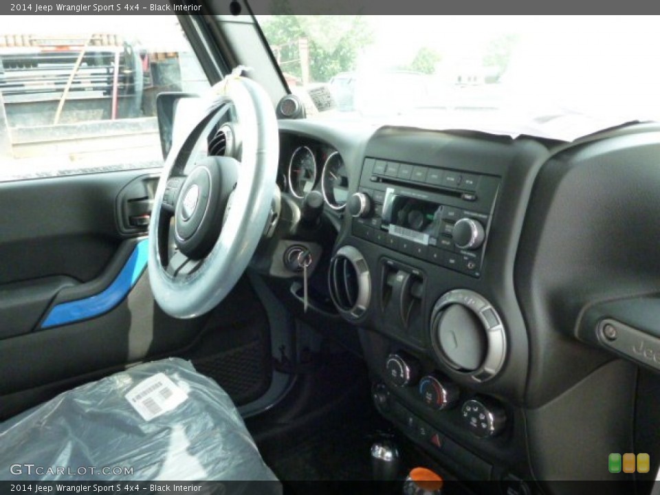 Black Interior Dashboard for the 2014 Jeep Wrangler Sport S 4x4 #84860805