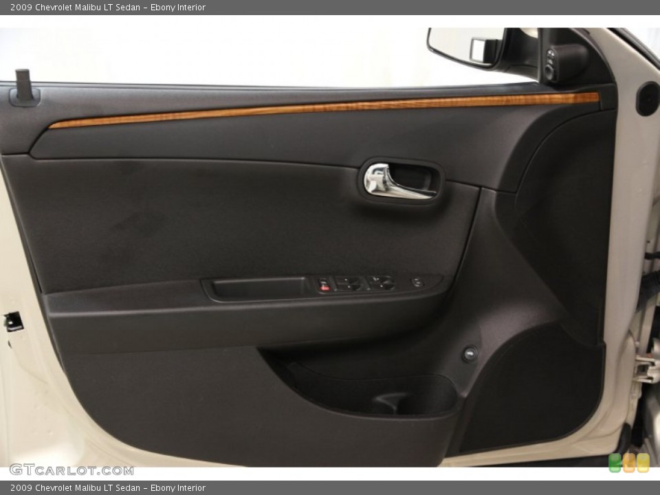 Ebony Interior Door Panel for the 2009 Chevrolet Malibu LT Sedan #84863522