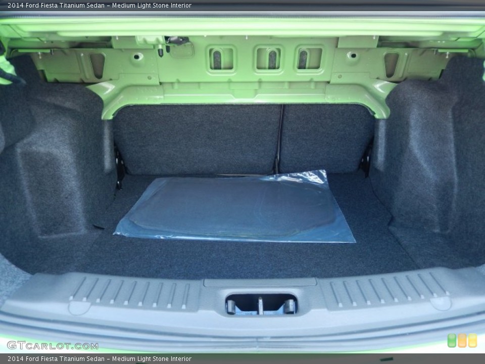 Medium Light Stone Interior Trunk for the 2014 Ford Fiesta Titanium Sedan #84865239