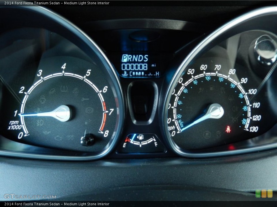 Medium Light Stone Interior Gauges for the 2014 Ford Fiesta Titanium Sedan #84865346