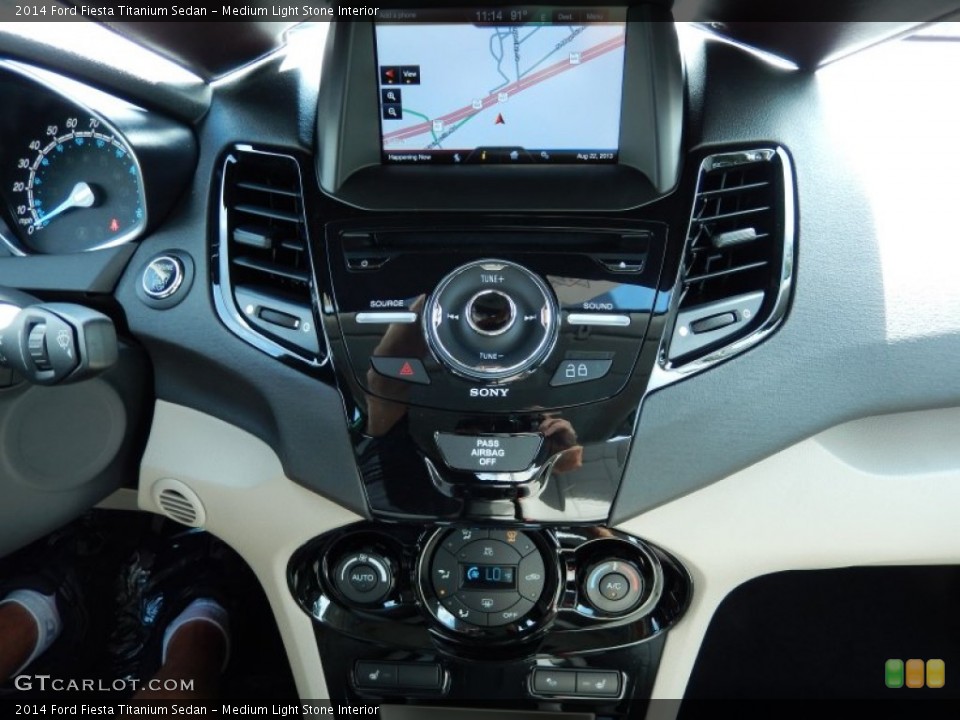 Medium Light Stone Interior Controls for the 2014 Ford Fiesta Titanium Sedan #84865375