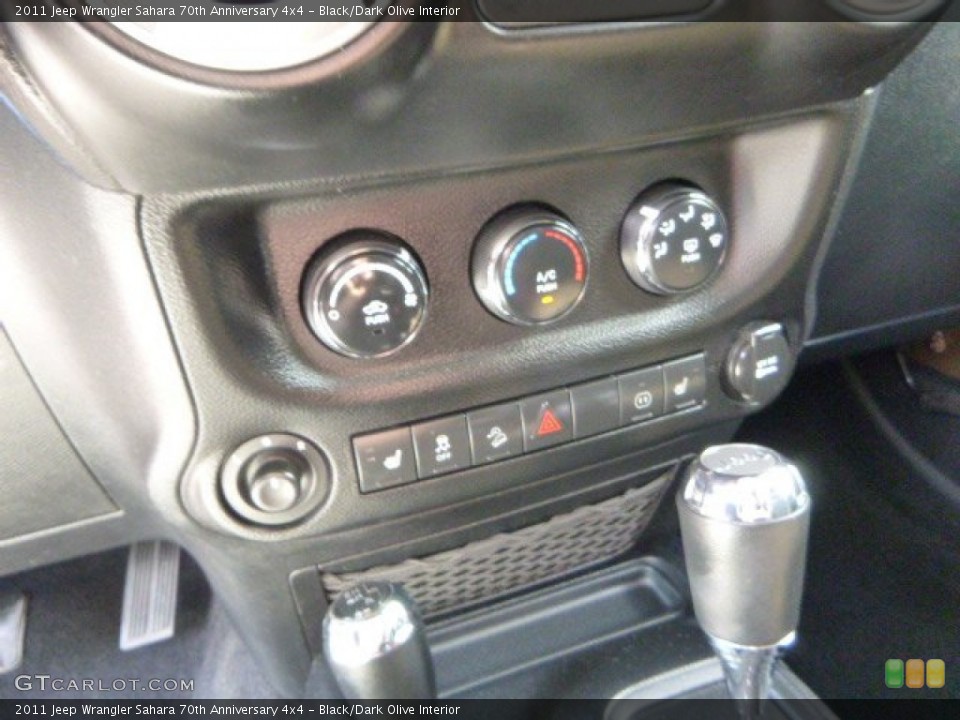 Black/Dark Olive Interior Controls for the 2011 Jeep Wrangler Sahara 70th Anniversary 4x4 #84911503