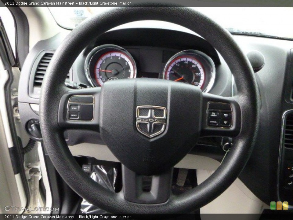 Black/Light Graystone Interior Steering Wheel for the 2011 Dodge Grand Caravan Mainstreet #84944419