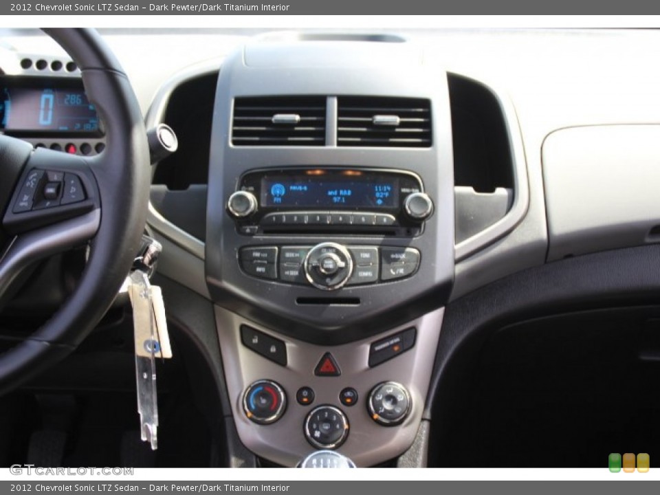 Dark Pewter/Dark Titanium Interior Controls for the 2012 Chevrolet Sonic LTZ Sedan #84950108