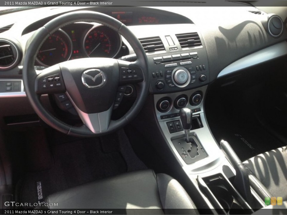 Black Interior Dashboard for the 2011 Mazda MAZDA3 s Grand Touring 4 Door #84962704