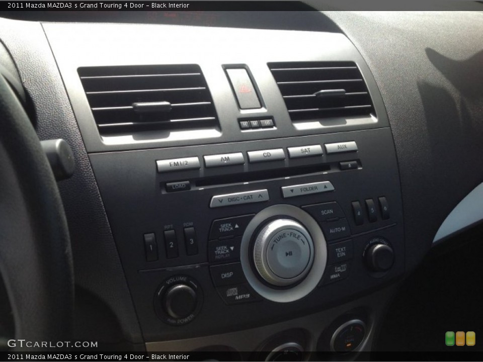 Black Interior Controls for the 2011 Mazda MAZDA3 s Grand Touring 4 Door #84962755