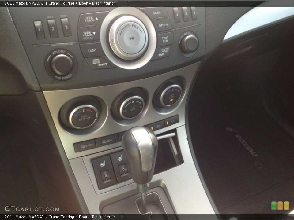 Black Interior Controls for the 2011 Mazda MAZDA3 s Grand Touring 4 Door #84962763