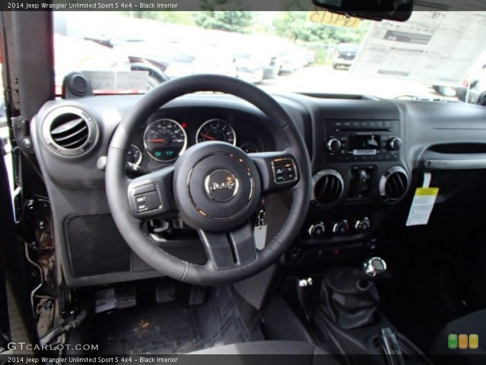 Black Interior Dashboard for the 2014 Jeep Wrangler Unlimited Sport S 4x4 #85038305