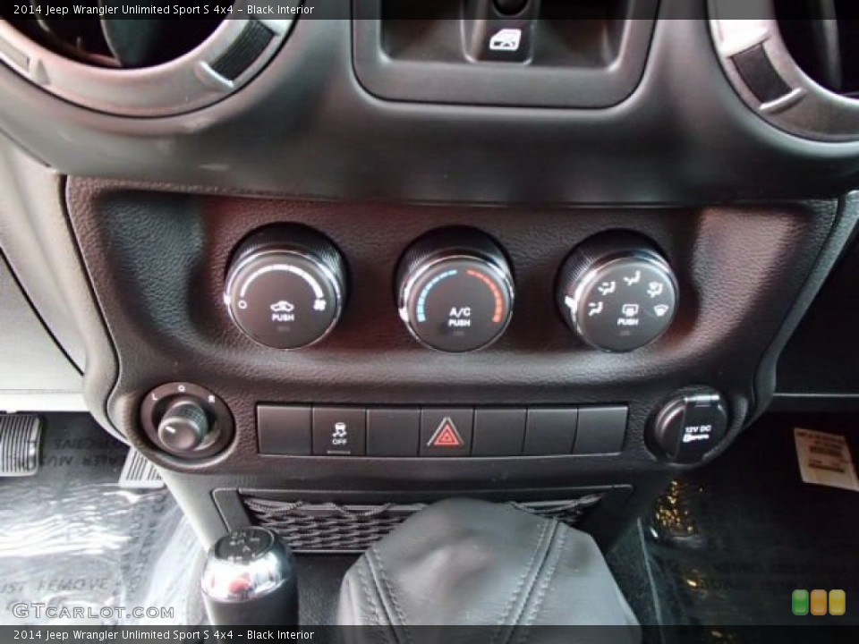 Black Interior Controls for the 2014 Jeep Wrangler Unlimited Sport S 4x4 #85038373