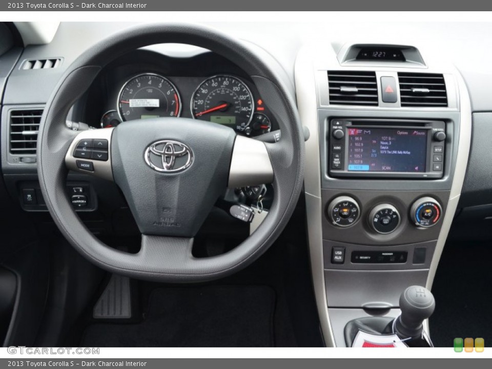 Dark Charcoal Interior Dashboard for the 2013 Toyota Corolla S #85074827