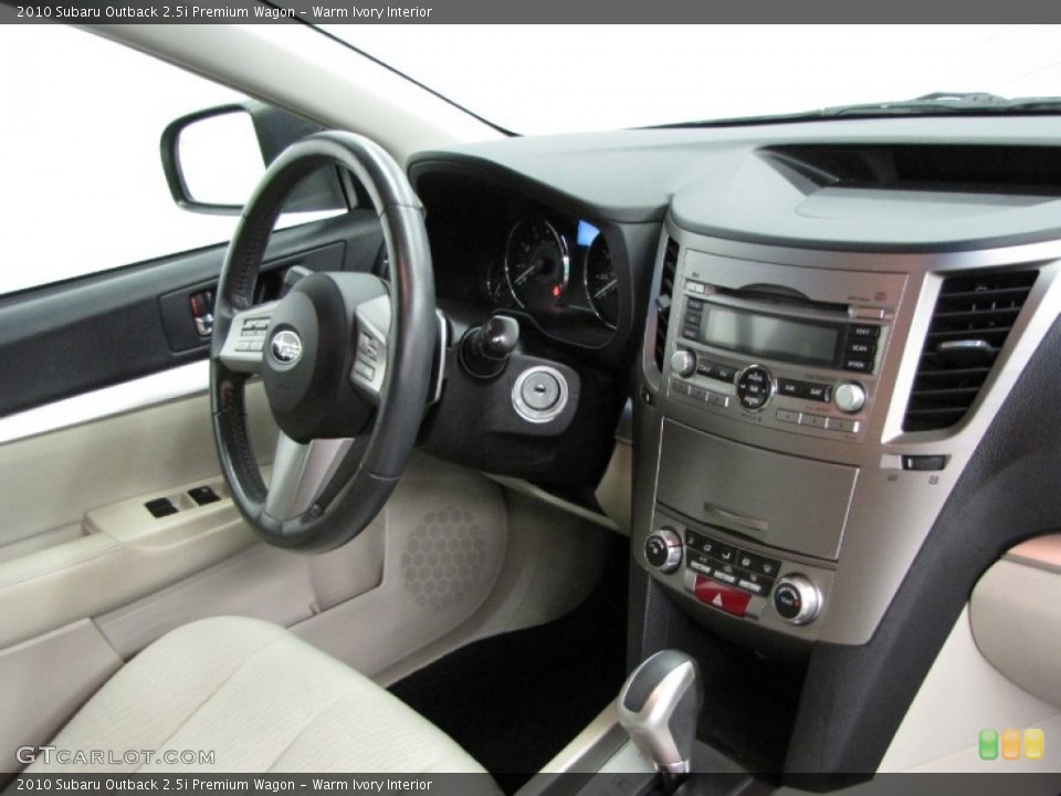 Warm Ivory Interior Controls for the 2010 Subaru Outback 2.5i Premium Wagon #85088519