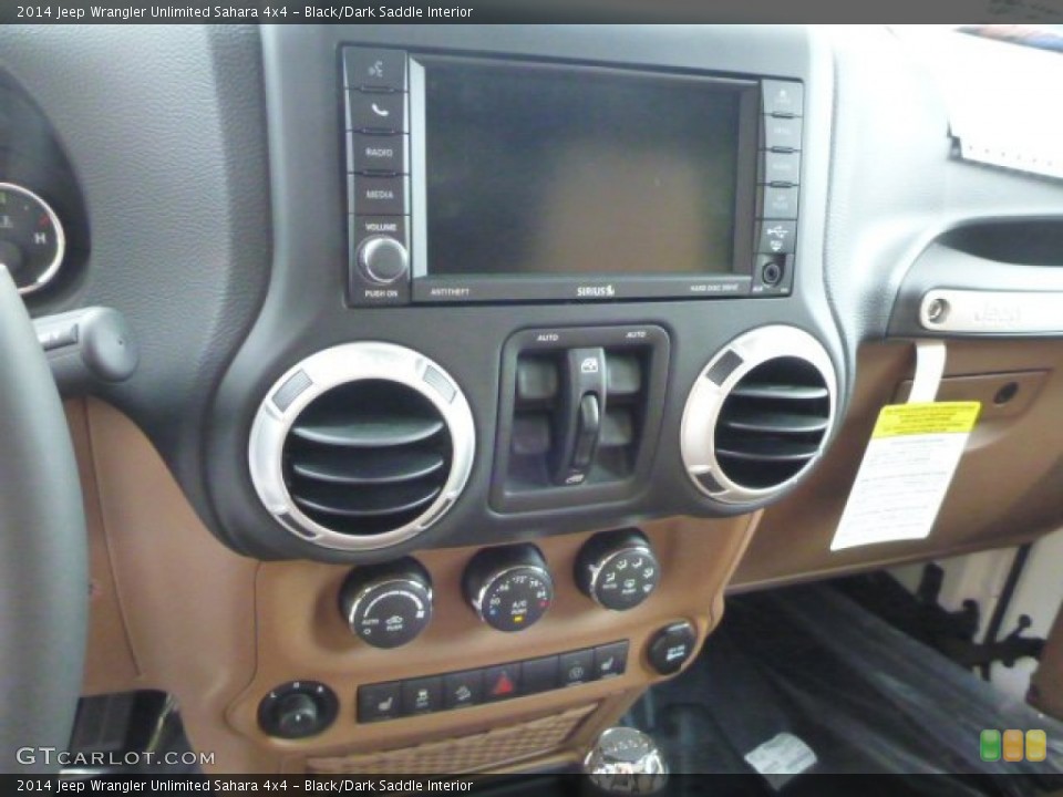 Black/Dark Saddle Interior Controls for the 2014 Jeep Wrangler Unlimited Sahara 4x4 #85111002