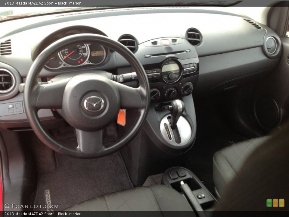 Black Interior Dashboard for the 2013 Mazda MAZDA2 Sport #85116470