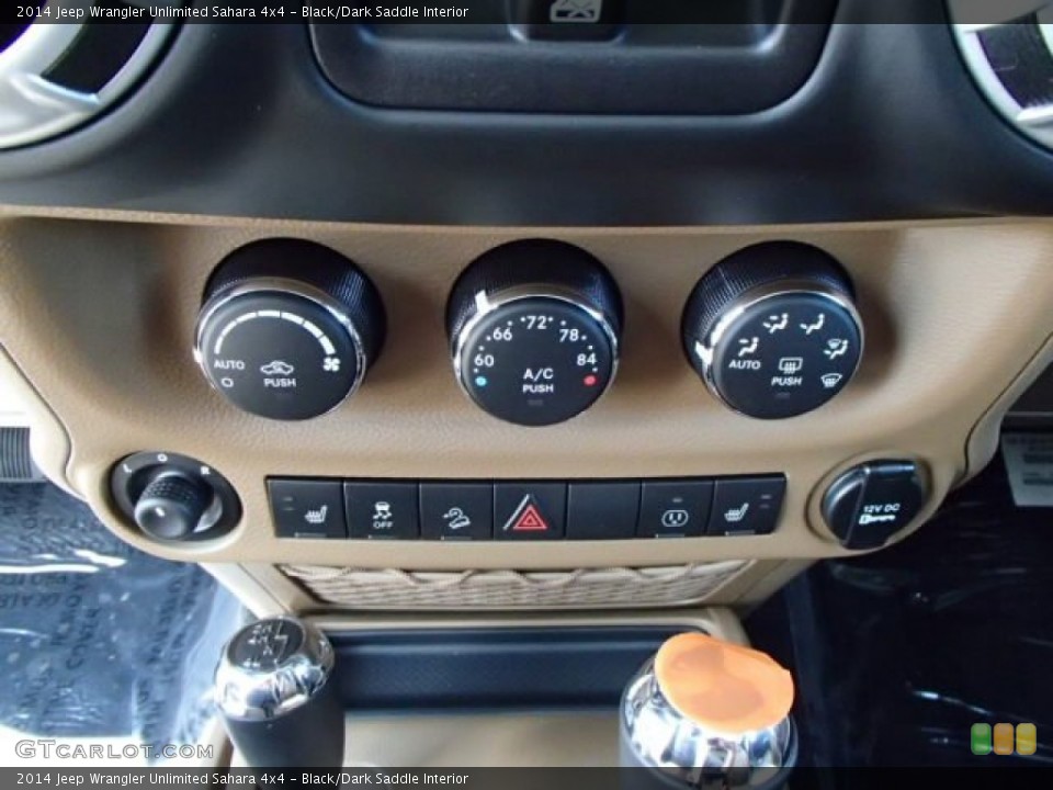 Black/Dark Saddle Interior Controls for the 2014 Jeep Wrangler Unlimited Sahara 4x4 #85194521