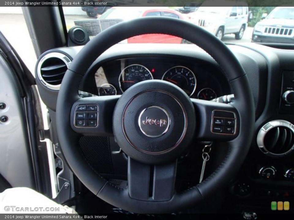 Black Interior Steering Wheel for the 2014 Jeep Wrangler Unlimited Sahara 4x4 #85196861