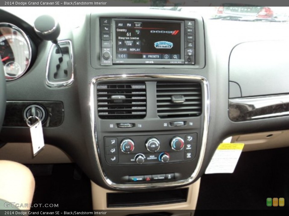 Black/Sandstorm Interior Controls for the 2014 Dodge Grand Caravan SE #85238227
