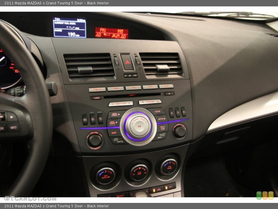Black Interior Controls for the 2011 Mazda MAZDA3 s Grand Touring 5 Door #85275437