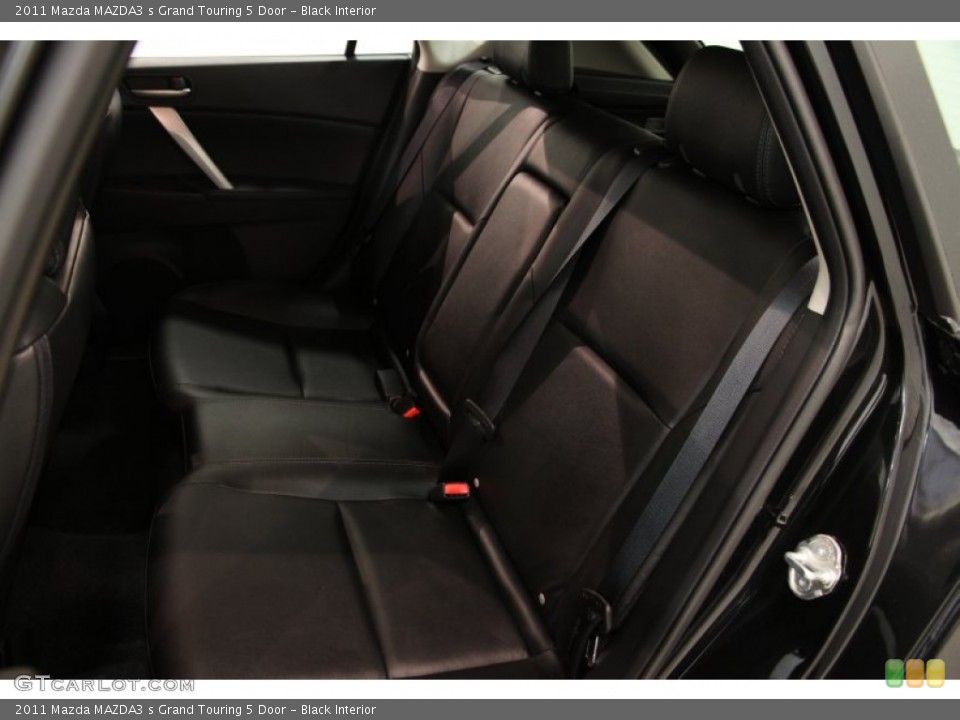 Black Interior Rear Seat for the 2011 Mazda MAZDA3 s Grand Touring 5 Door #85275566