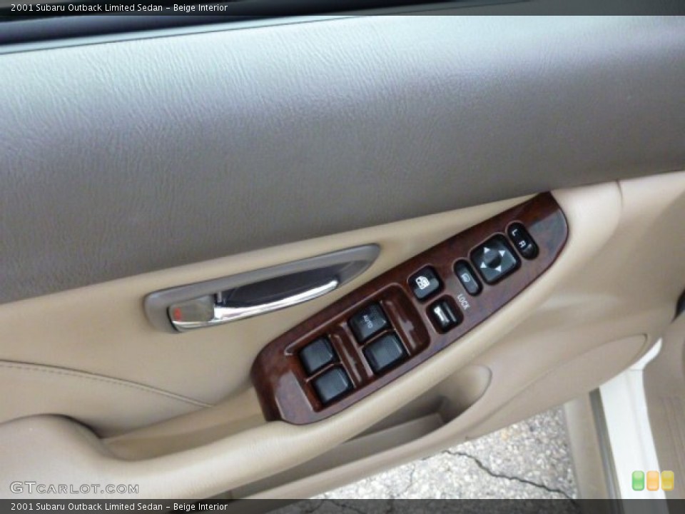 Beige Interior Controls for the 2001 Subaru Outback Limited Sedan #85276550