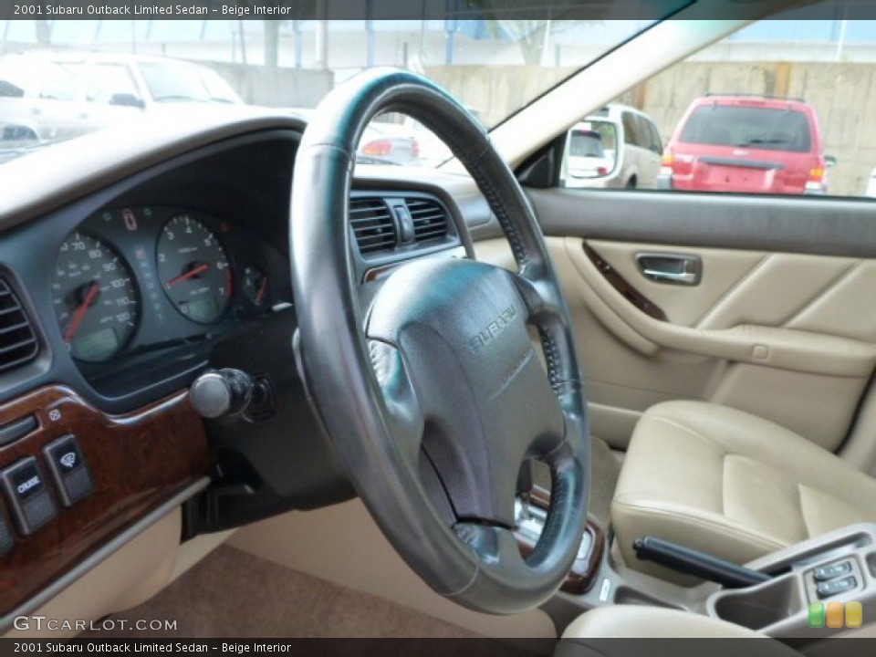 Beige Interior Steering Wheel for the 2001 Subaru Outback Limited Sedan #85276619
