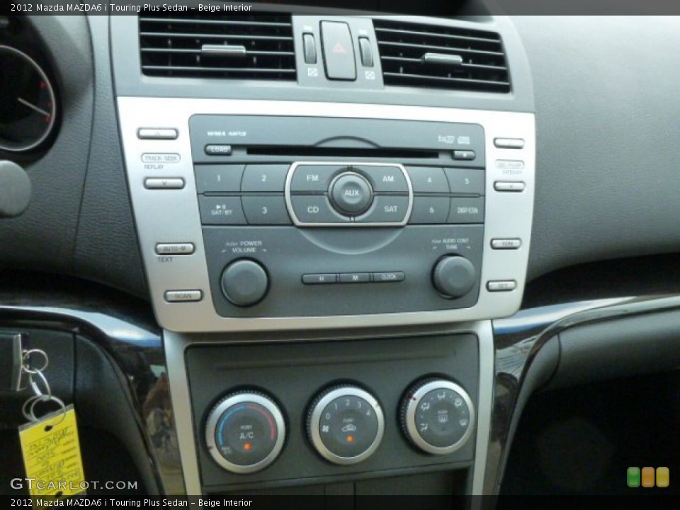 Beige Interior Controls for the 2012 Mazda MAZDA6 i Touring Plus Sedan #85301549
