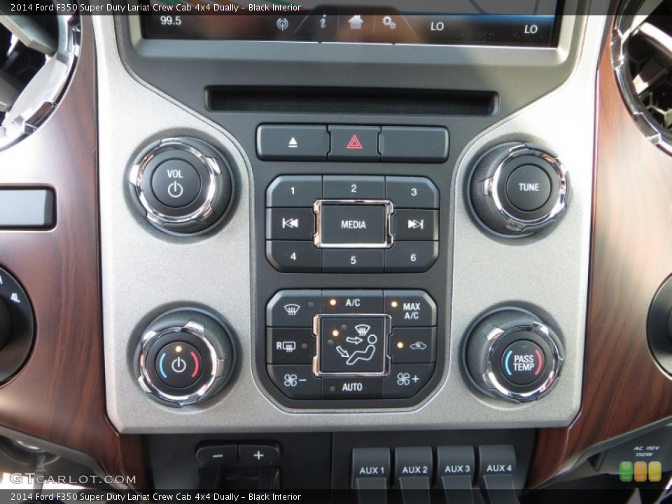 Black Interior Controls for the 2014 Ford F350 Super Duty Lariat Crew Cab 4x4 Dually #85350864