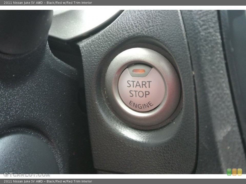 Black/Red w/Red Trim Interior Controls for the 2011 Nissan Juke SV AWD #85352327