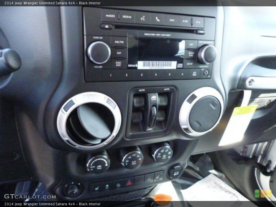 Black Interior Controls for the 2014 Jeep Wrangler Unlimited Sahara 4x4 #85379452