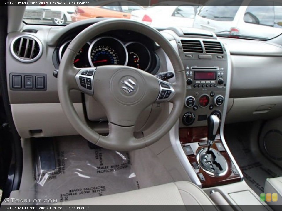 Beige Interior Dashboard for the 2012 Suzuki Grand Vitara Limited #85388849