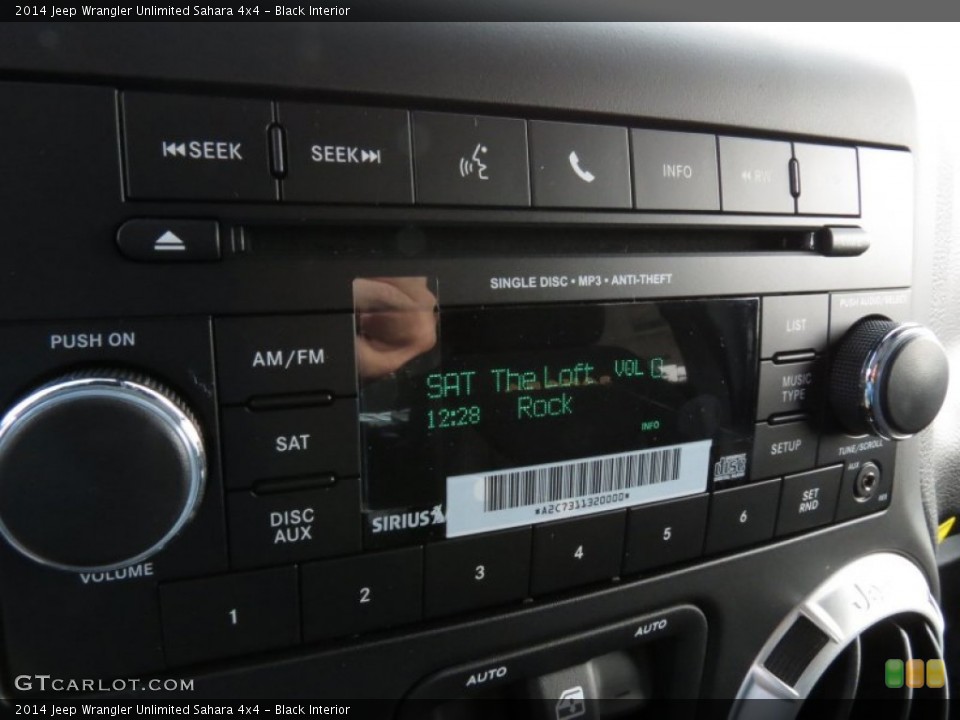 Black Interior Audio System for the 2014 Jeep Wrangler Unlimited Sahara 4x4 #85391053