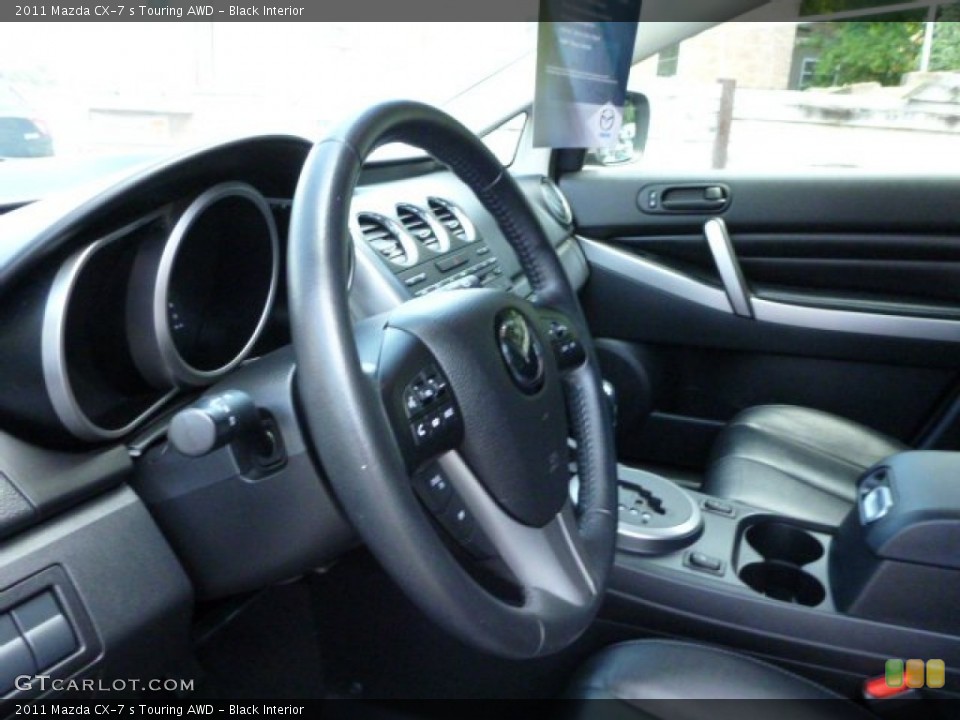 Black Interior Steering Wheel for the 2011 Mazda CX-7 s Touring AWD #85444668