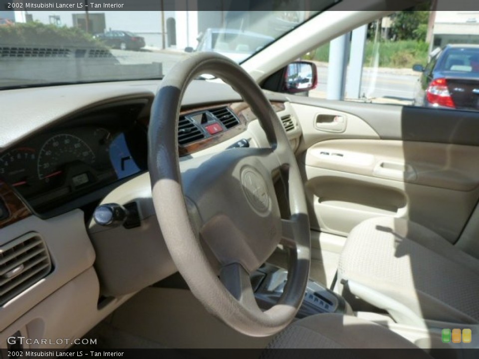 Tan Interior Steering Wheel for the 2002 Mitsubishi Lancer LS #85447389