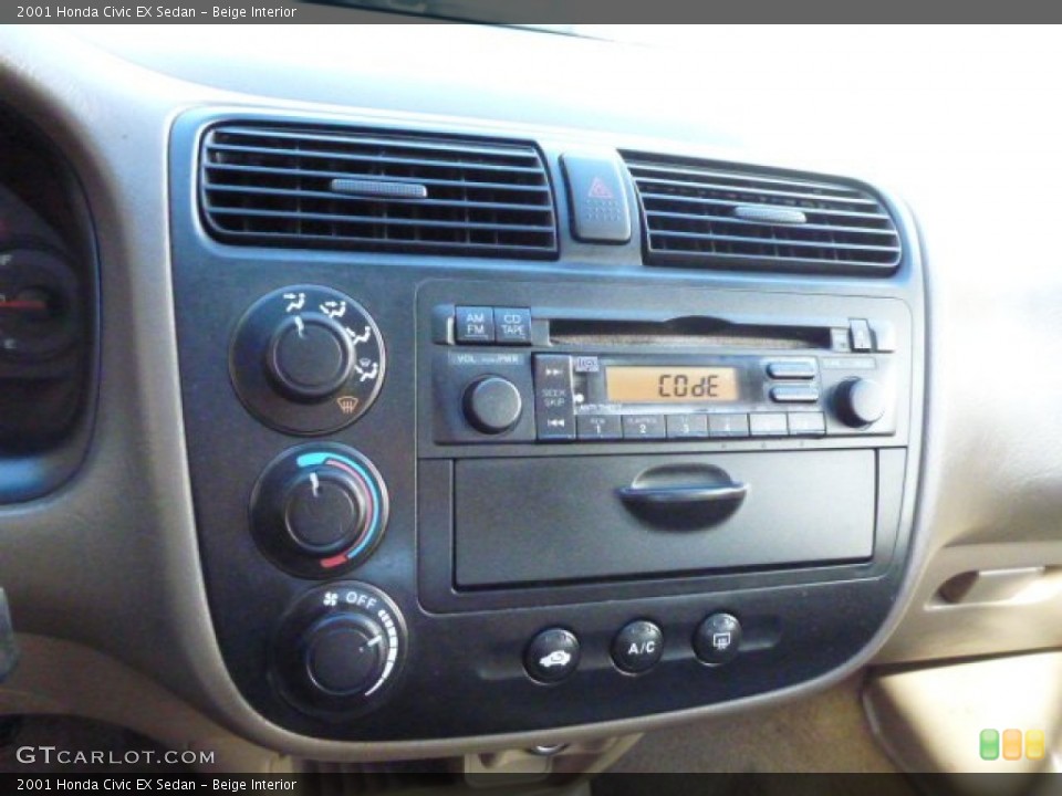Beige Interior Controls for the 2001 Honda Civic EX Sedan #85485782