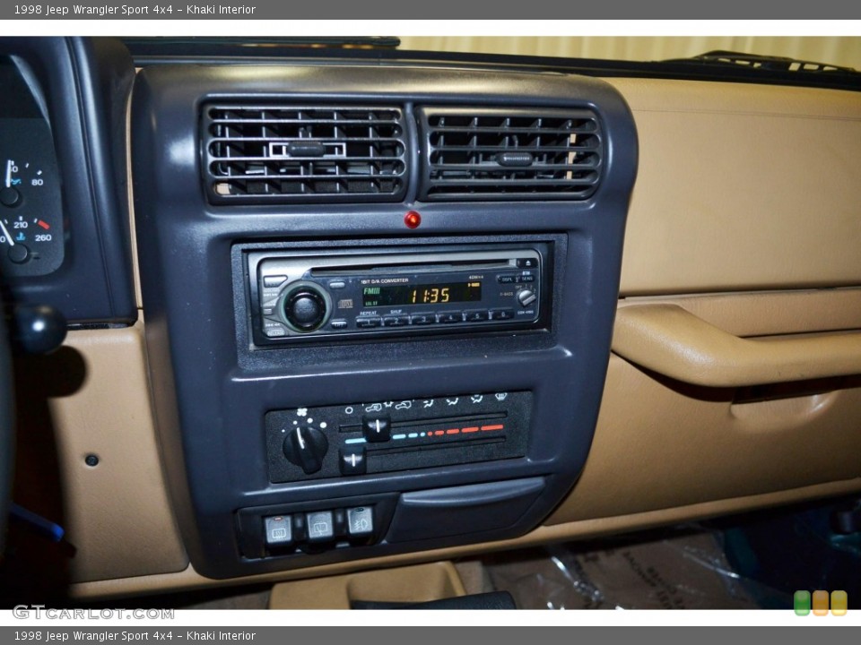 Khaki Interior Controls for the 1998 Jeep Wrangler Sport 4x4 #85487402
