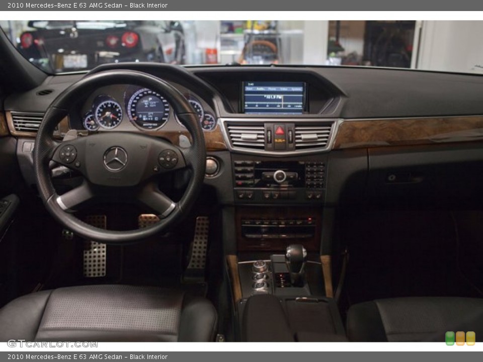 Black Interior Dashboard for the 2010 Mercedes-Benz E 63 AMG Sedan #85548734