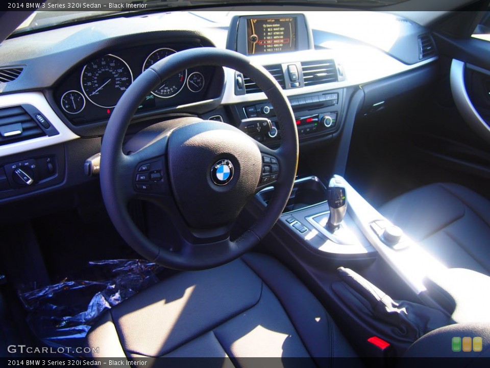 Black Interior Prime Interior for the 2014 BMW 3 Series 320i Sedan #85588811