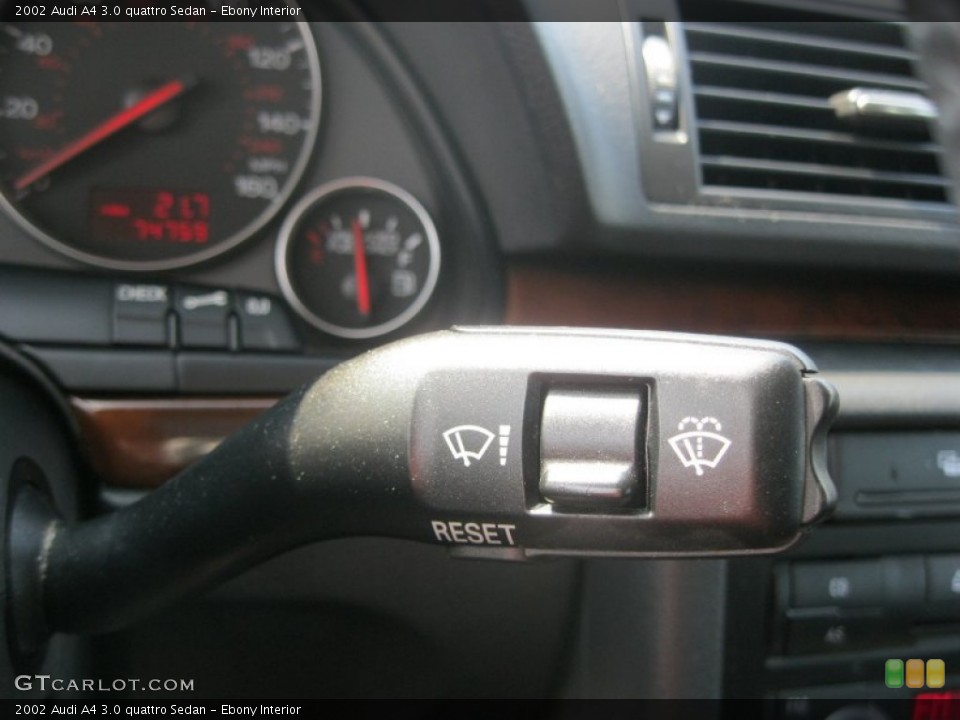 Ebony Interior Controls for the 2002 Audi A4 3.0 quattro Sedan #85621447