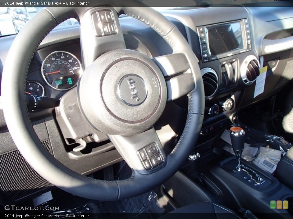 Black Interior Steering Wheel for the 2014 Jeep Wrangler Sahara 4x4 #85680725