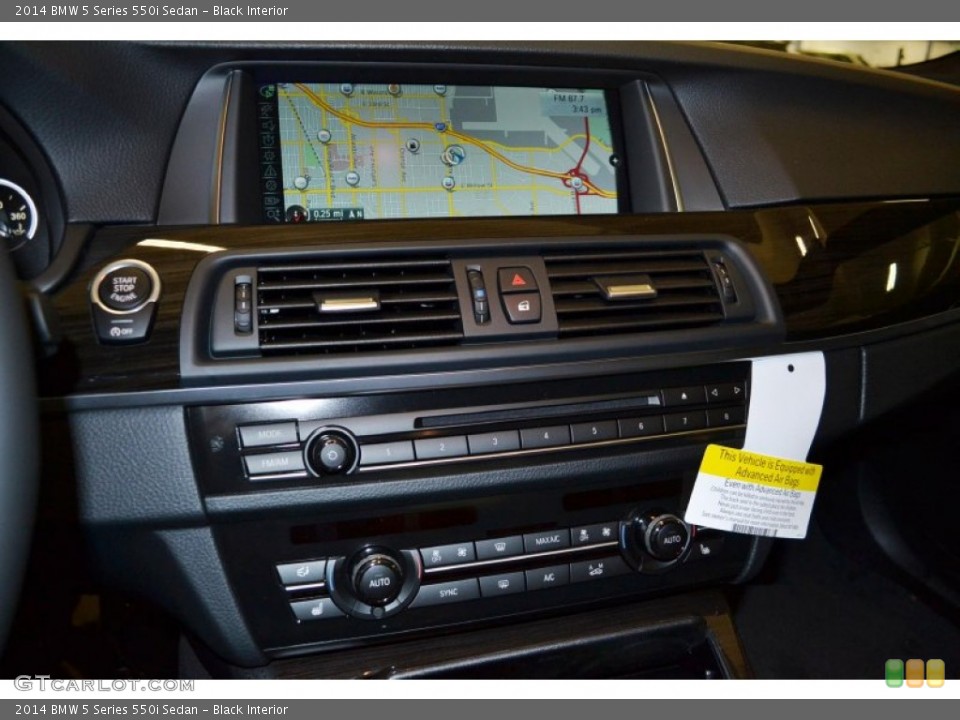 Black Interior Controls for the 2014 BMW 5 Series 550i Sedan #85696649