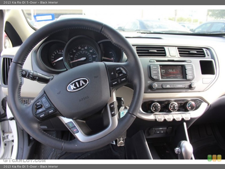 Black Interior Steering Wheel for the 2013 Kia Rio EX 5-Door #85717081