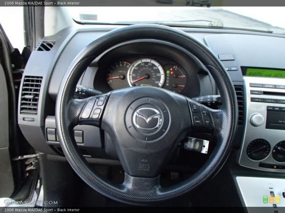 Black Interior Steering Wheel for the 2006 Mazda MAZDA5 Sport #85717108