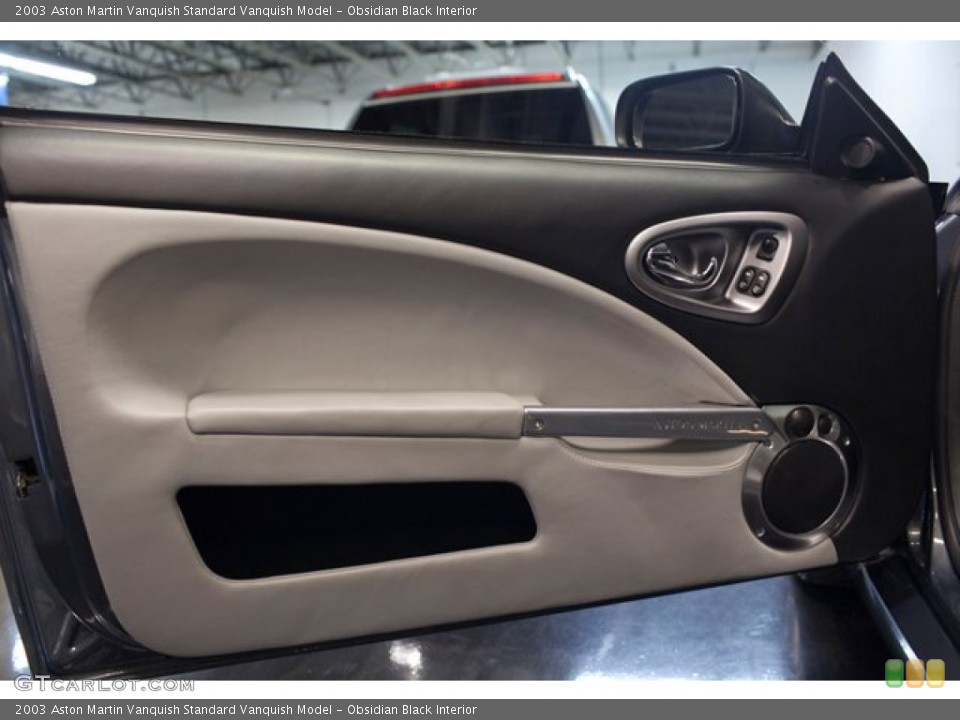Obsidian Black Interior Door Panel for the 2003 Aston Martin Vanquish  #85722540