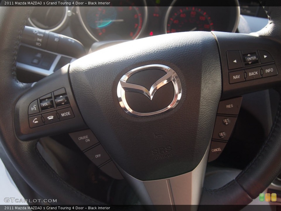 Black Interior Controls for the 2011 Mazda MAZDA3 s Grand Touring 4 Door #85741168