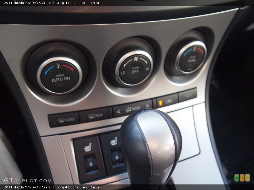 Black Interior Controls for the 2011 Mazda MAZDA3 s Grand Touring 4 Door #85741195