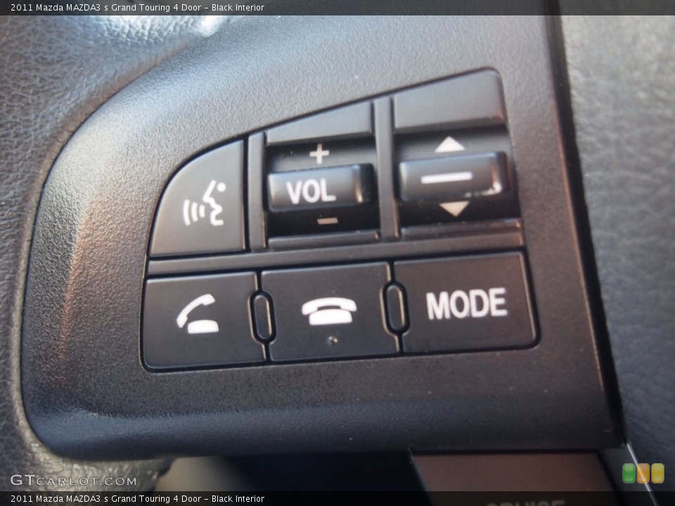 Black Interior Controls for the 2011 Mazda MAZDA3 s Grand Touring 4 Door #85741228
