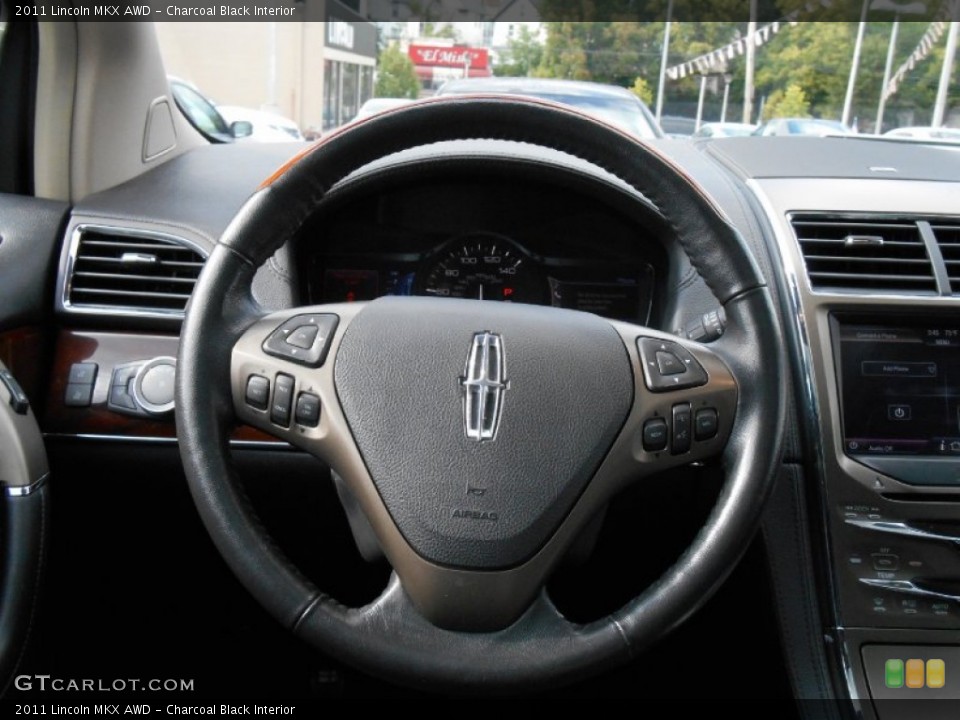 Charcoal Black Interior Steering Wheel for the 2011 Lincoln MKX AWD #85749576