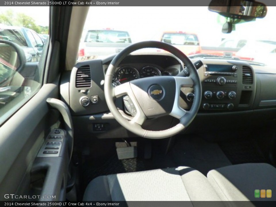 Ebony Interior Dashboard for the 2014 Chevrolet Silverado 2500HD LT Crew Cab 4x4 #85754358