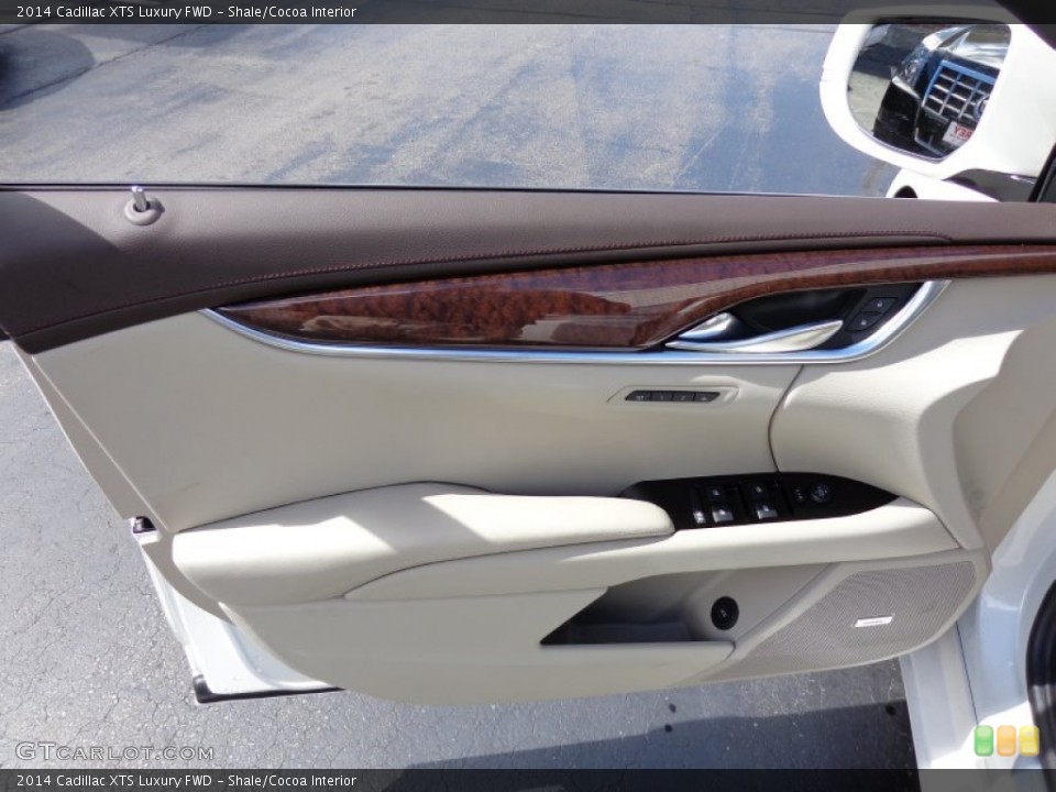 Shale/Cocoa Interior Door Panel for the 2014 Cadillac XTS Luxury FWD #85779610