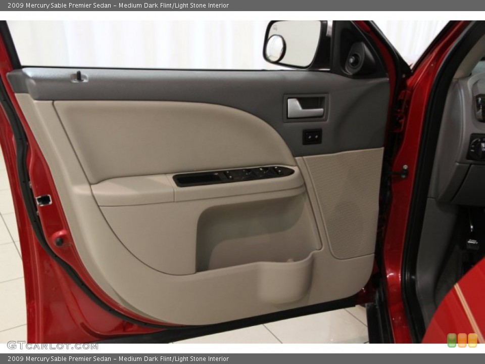 Medium Dark Flint/Light Stone Interior Door Panel for the 2009 Mercury Sable Premier Sedan #85784035